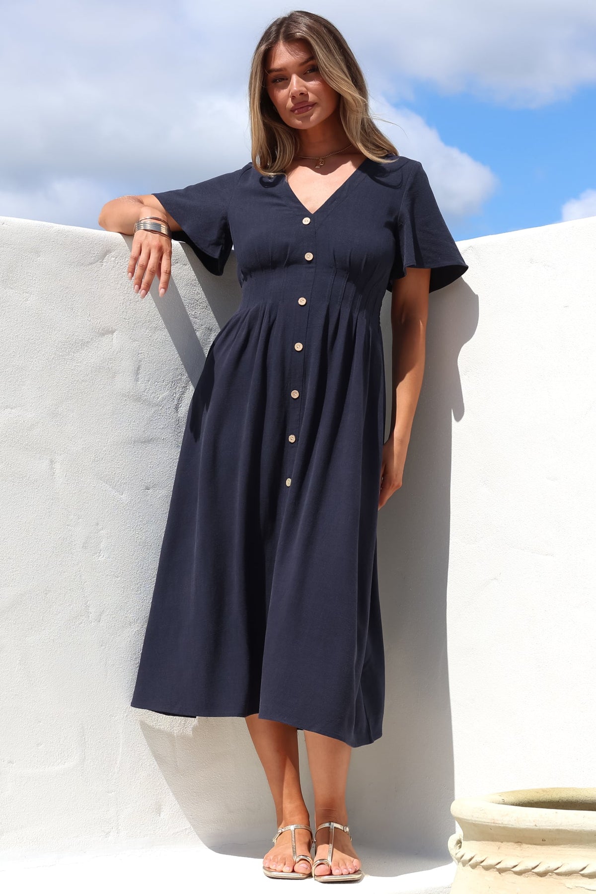 Stellar Midi Dress - Flutter Sleeve A-Line Dress with Pin Tuck Waist Detail in Navy