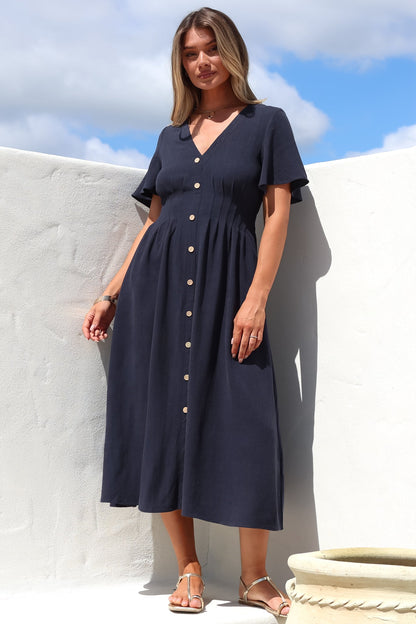 Stellar Midi Dress - Flutter Sleeve A-Line Dress with Pin Tuck Waist Detail in Navy