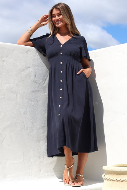 Stellar Midi Dress - Flutter Sleeve A-Line Dress with Pin Tuck Waist Detail in Navy