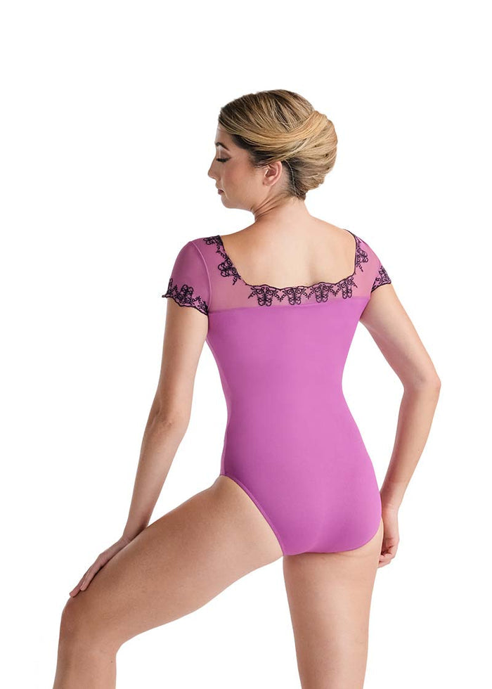 Ballet Rosa women's Jacquie cap sleeve leotard in pink with mesh sleeves and black lace neckline and sleeve hems.