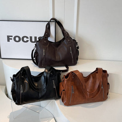 Large capacity shoulder bag