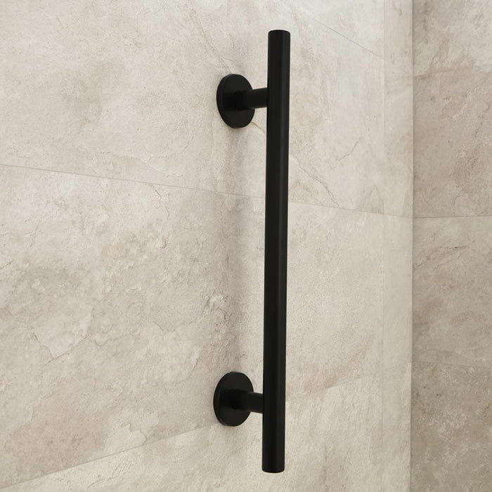 Full view of Nymas Matt Black Straight Grab Rail grab rail with circular wall plates and a textured grip, designed to provide support in bathrooms and other areas.